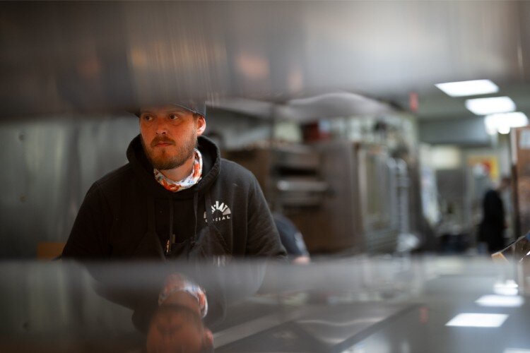 Chef Clayton James works on the lunch menu at Hi Hat.