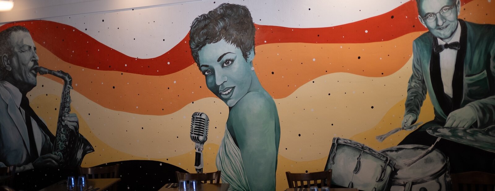 A mural hand painted by Hi Hat employee Cheyenne Shuttlesworth.